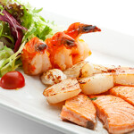 Shrimp, scallops, and salmon were all among the top seafood species consumed by Americans in 2020.