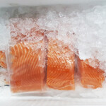 A settlement has been reached in a class-action lawsuit against five major Norwegian salmon-farming firms.