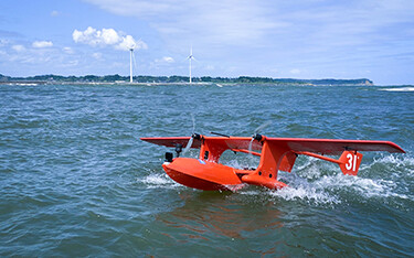 A Hamadori drone takes off from the sea surface.