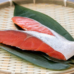 Slices of salmon being offered as part of Seven & I Group's Alaska Seafood Fair.