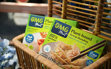 Two packages of OMG Meat's new plant-based shrimp dumplings.