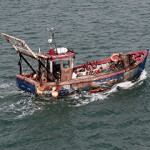 A U.K.-based fishing vessel returning to port.