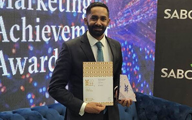 Sea Harvest Group Limited Head of Marketing Jared Patel receiving the Mondelēz 2022 Rising Star of the Year Award.