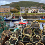 Lobster pots in the harbor in the small coastal village of Helmsdale in Sutherland, on the east coast of Scotland.