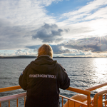 A member of the Swedish Agency for Marine and Water Management on a fishing vessel.