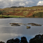 Aquaculture in scotland with dark clouds