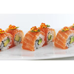 A set of six sushi rolls wrapped in Norwegian salmon.