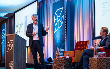 Ahold Delhaize Vice President of Product Integrity Hugo Byrnes hosting a panel at the Global Shrimp Forum.