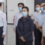 Fuzhou Hong Dong Fishery Chairman Lan Pingyong (far right) with Chinese Communist Party officials.