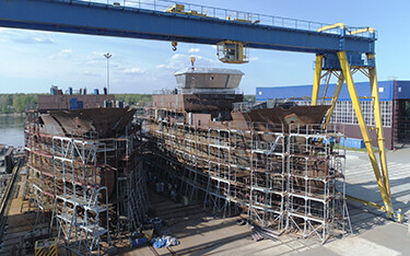 Two crab vessels being built in a Pella shipyard.