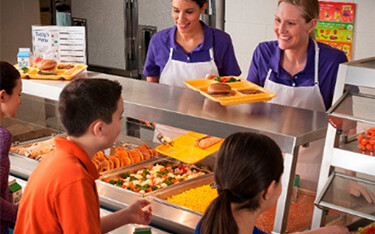 Students being served lunch in the U.S.