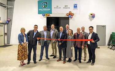 Representatives of Scoular, Da Yang Seafood, and Bornstein Seafoods cut the ribbon on the new fishmeal processing facility.