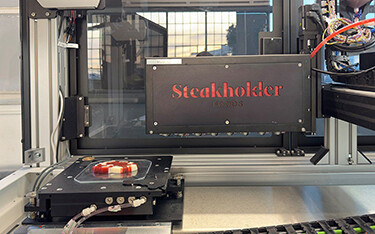 Steakholder Foods logo on one of the 3D printers that make its eel products.