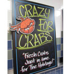 A sign for a sale on crabs in time for the holiday season.