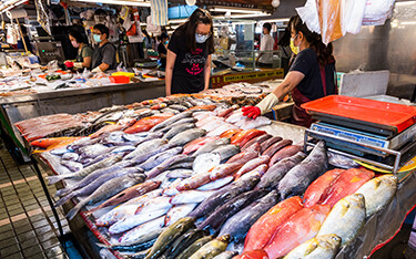 A stall selling fish at a traditional market in Kaohsiung, Taiwan.