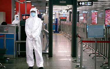 A coronavirus testing checkpoint at a subway entrance in Beijing.