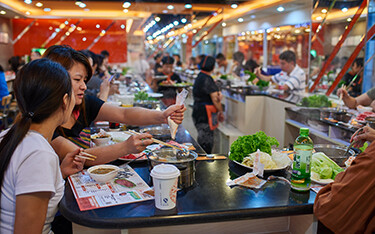 Customers at a restaurant in China.