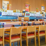 The interior of a Sushiro restaurant in Japan.