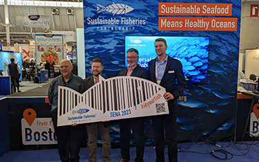 Publix Supermarkets Seafood Director Guy Pizzuti, SFP Global Policy Director Brad Spear, High Liner Foods VP of Sustainability Bill DiMento, and Thai Union North America Director of Sustainability Blake Stok pose for a photo celebrating the launch of new pilot projects.