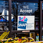 A supermarket with a SNAP sign.