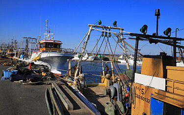 Fishing boats moored at the dock in Choshi, Japan.
