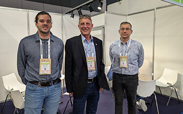 The staff of Ukrkharchopromcomplex at their booth at Seafood Expo Global 2023.