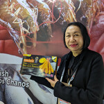 Fisherfarms CEO Imelda J. Madarang showing off its new Corn & Coconut Breaded Shrimp.