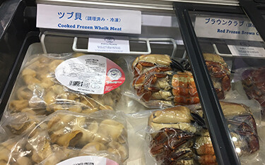 Examples of Rooney Fish's products on display at FOODEX in Tokyo, Japan.