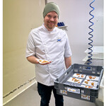 A Seabed Innovation employee showing off some of the sea urchin roe the company has harvested.