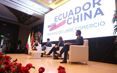 A panel discussing the benefits of the Ecuador-China free trade agreement hosted by the Ecuadorian Minister of Production, Foreign Trade, Investment, and Fisheries.