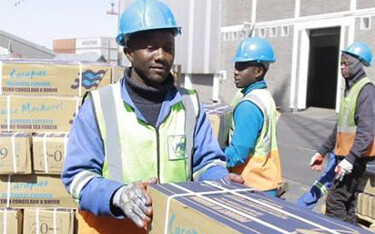 Oceana Group workers stacking boxes of horse mackerel in Namibia