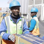 Oceana Group workers stacking boxes of horse mackerel in Namibia
