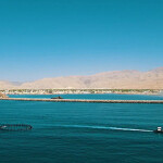 A sea cage being hauled into place in Oman.