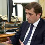 Russian Federal Agency for Fisheries Head Ilya Shestakov behind a desk.