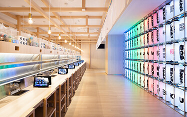 The interior of a new Kura Sushi restaurant.