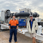 Lachlan Basett, General Manager of Fresh by Design, and Mat Ryan, Managing Director of Aquna Sustainable Murray Cod, standing in front of their in-water stunning solution.