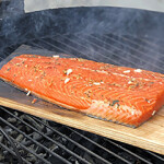 Farmed Atlantic almon on a barbeque.