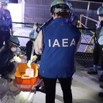 An IAEA inspector oversees water testing at the Fukushima plant.