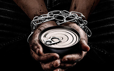 An image provided by BLOOM of a tuna can being held by