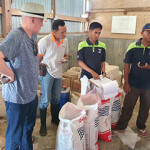 Lim Shrimp CEO Peter Fleming with shrimp aquafeed.