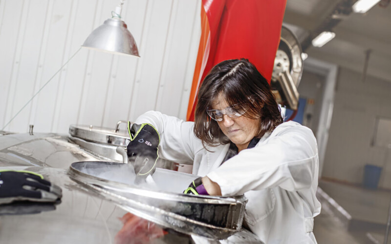 Benchmark Genetics Salmon Ova Quality Manager Rosana Estevez working in a Benchmark lab