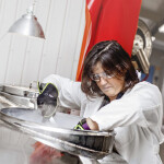 Benchmark Genetics Salmon Ova Quality Manager Rosana Estevez working in a Benchmark lab