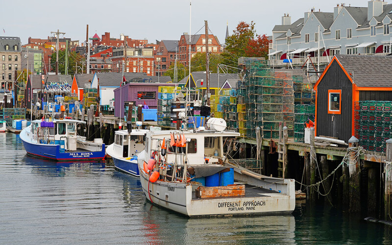 A row of lobster boats in the harbor of Portland, Maine