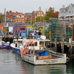 A row of lobster boats in the harbor of Portland, Maine