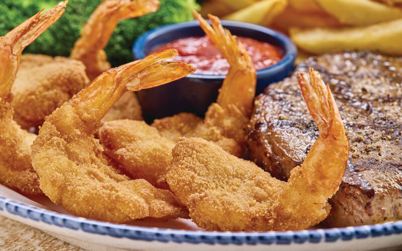 A pile of breaded shrimp