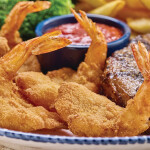 A pile of breaded shrimp