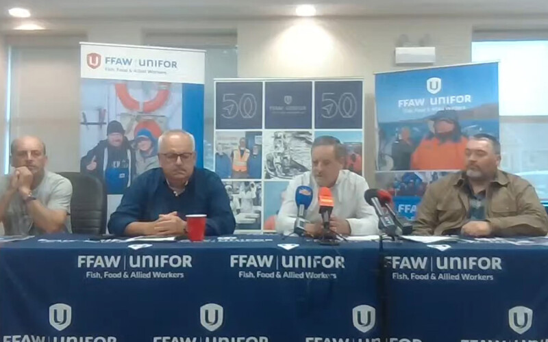 Members of the Fish, Food, and Allied Workers Union hold a press conference in Newfoundland, Canada
