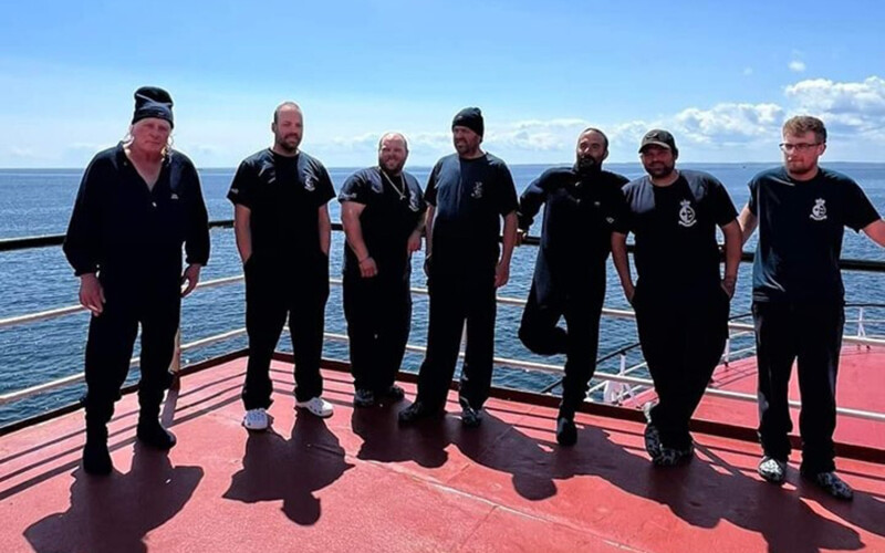 Seven crew from were rescued from a life raft after the F/V Elite Navigator burned and sank.