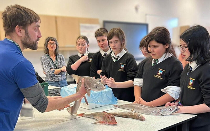Students at the Sir John Hunt School in Plymouth, U.K., being educated on local fish