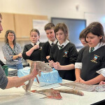 Students at the Sir John Hunt School in Plymouth, U.K., being educated on local fish